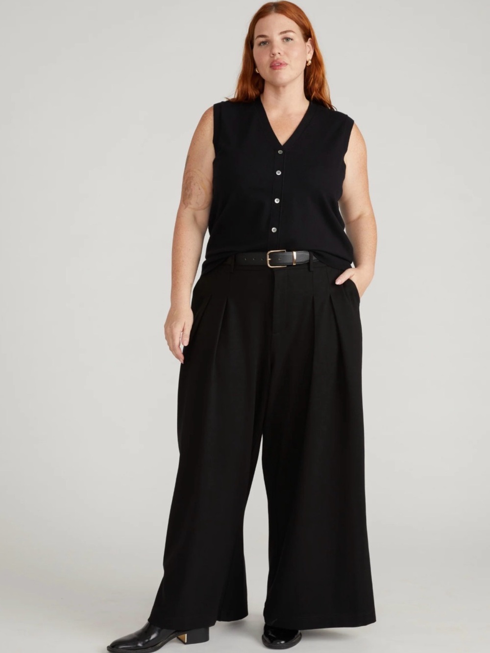 August Max Woman button-front vest featuring a V-neckline.